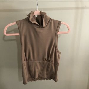 Cropped hooded sweatshirt/tank top with rushing around the waist